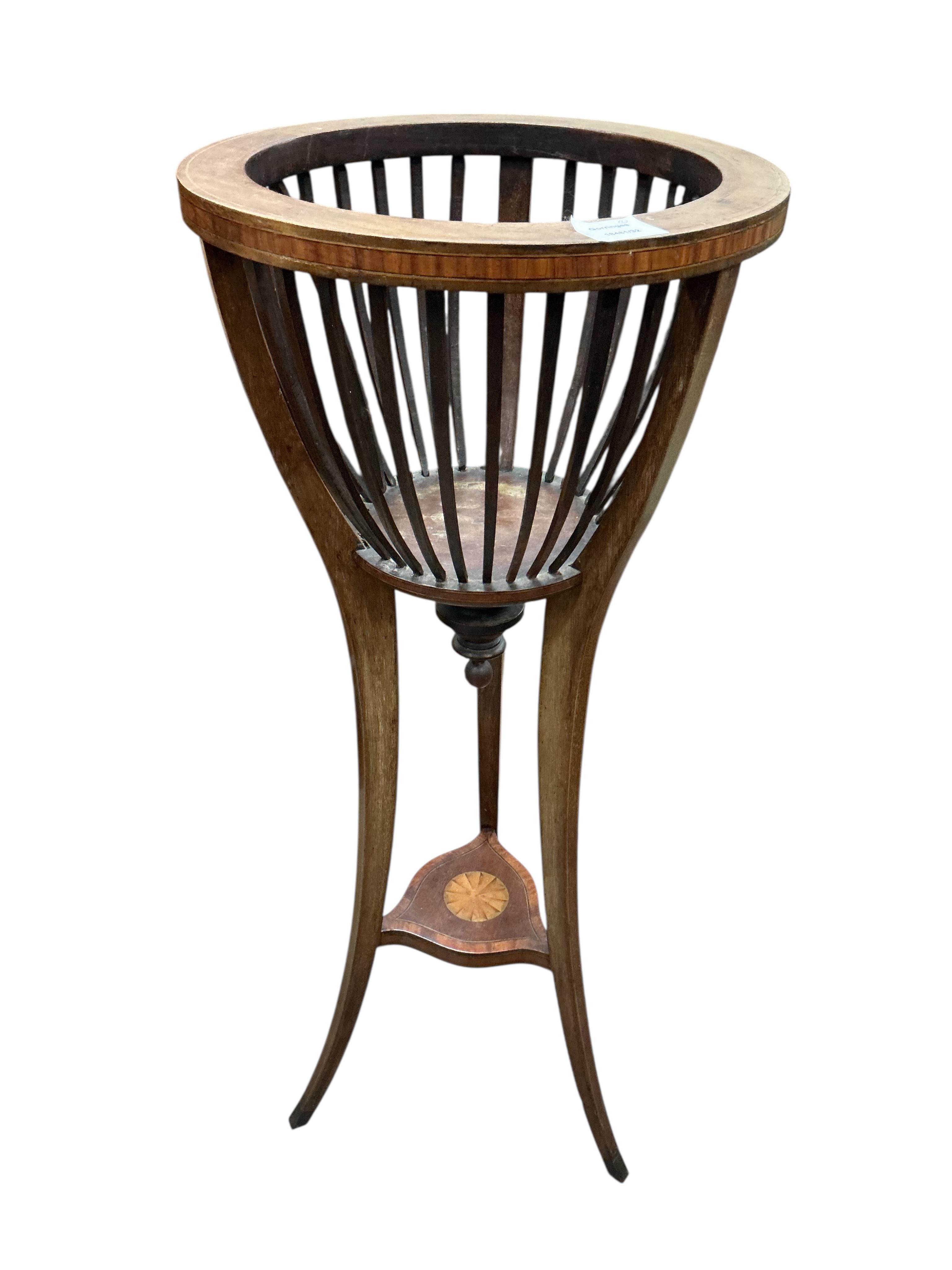 A Victorian rosewood spoon back chair, together with an Edwardian inlaid mahogany plant stand (lacking liner)